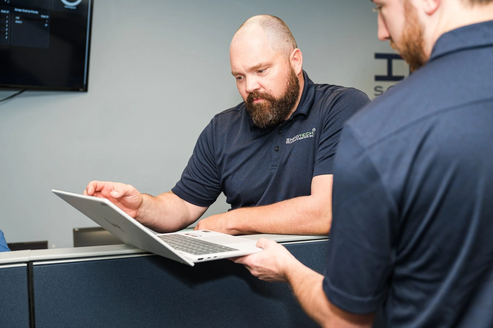 IT support team providing reliable technology solutions for businesses in Normal, IL.